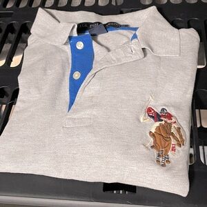 16 shirts all in one bundle. Check them out some real finds!